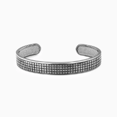 Silver bracelet with grid pattern on a white background