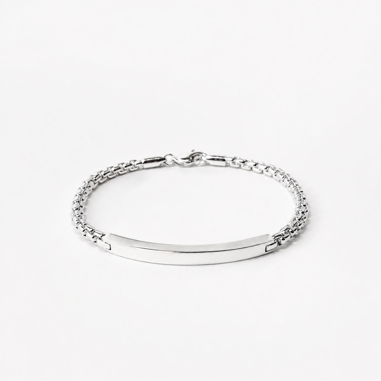 A silver chain bracelet with a smooth, polished horizontal bar clasp, displayed on a clean white background.
